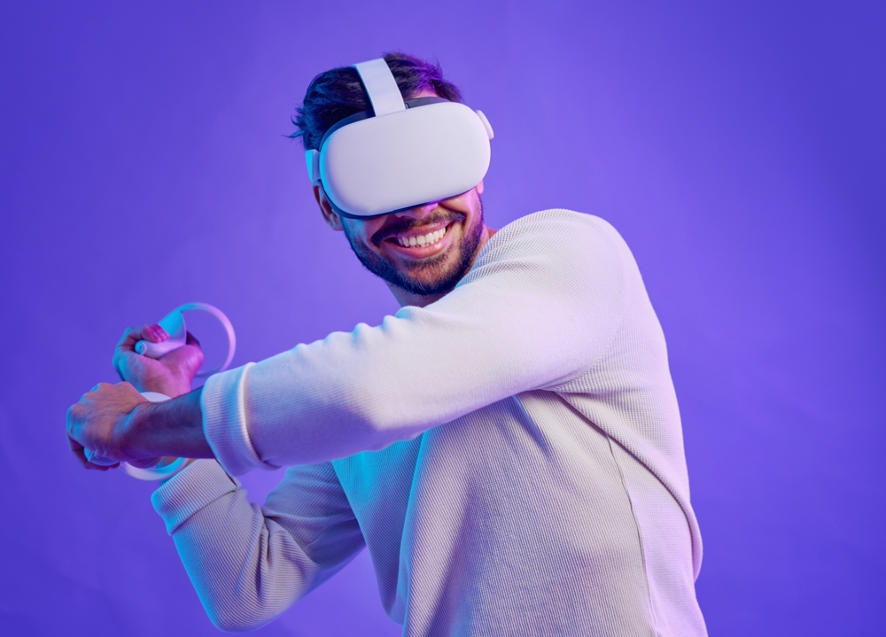 Man wearing VR headset and controller